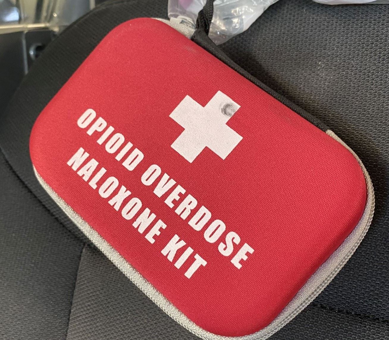 A picture showing an Opioid Overdose Kit inside a Hanover Cruiser